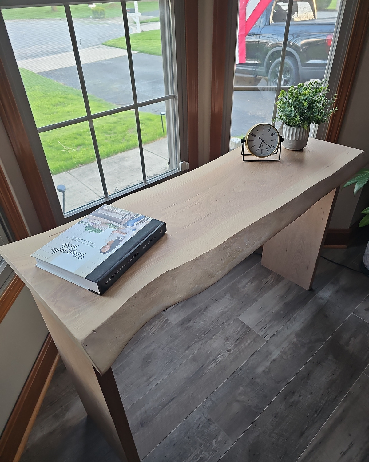 Meridian live-edge white oak console in a bright room